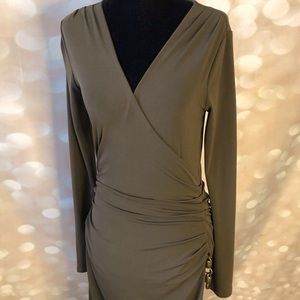 Fitted olive dress with rush detail at the hip